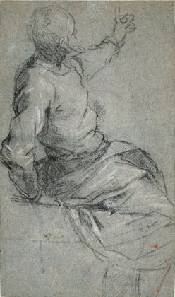 A bearded man, seated, his left arm raised