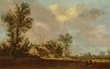 A farm in a wooded landscape