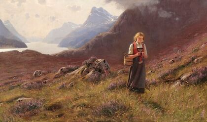 A girl knitting in a Norwegian landscape