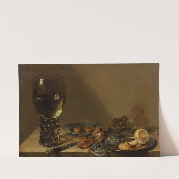 A large roemer, a silver knife, a gold pocket watch with blue ribbon, a pewter plate with a peeled lemon, with other objects on a ledge by Willem Claesz Heda