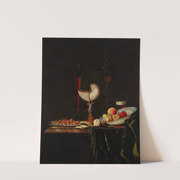 A nautilus cup, a flute, a façon-de-Venise and a wine and beer glass with nuts on a silver charger by Johann Georg Hinz