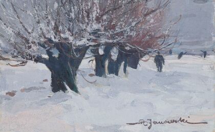 A row of trees against the background of snow