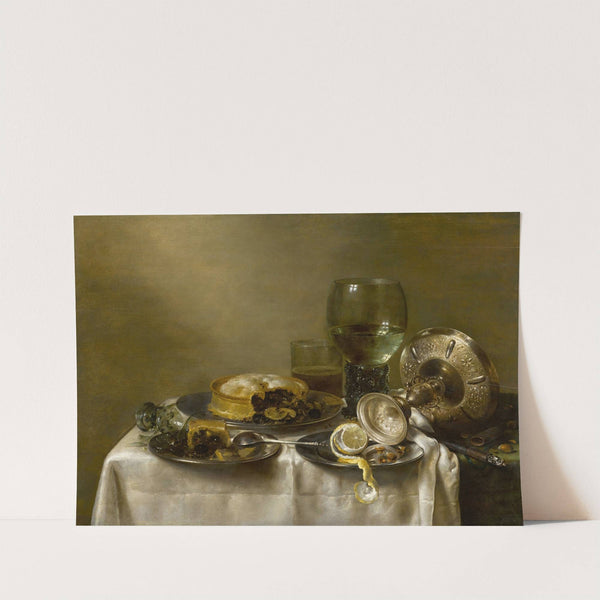A still life with an overturned silver tazza, glassware, pies and a peeled lemon on a table by Willem Claesz Heda
