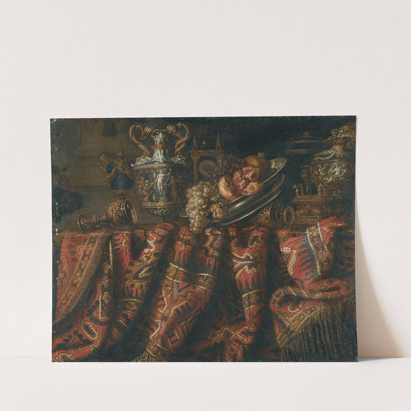 A Still Life With Pomegranates, And Grapes On A Table Draped With An Ornate Turkish Carpet And Assorted Orfèvrerie by Jacques Hupin