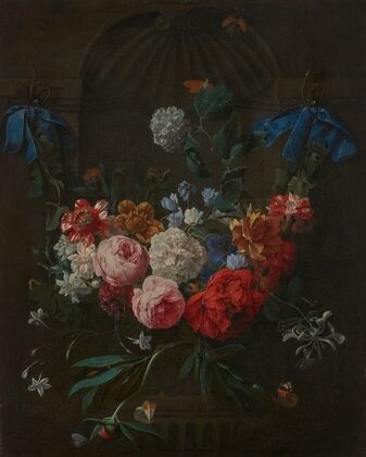 A swag of roses, peonies, anemones, snowballs, carnations and other flowers suspended from ribbons before a stone niche