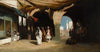 A view of a North African courtyard with market beyond