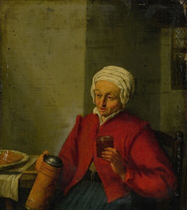A woman holding a jug and a cup