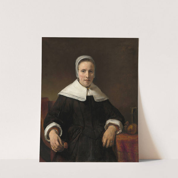 A Woman Holding a Pink by Rembrandt van Rijn