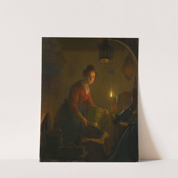 A Woman in a Kitchen by Candlelight by Michiel Versteegh