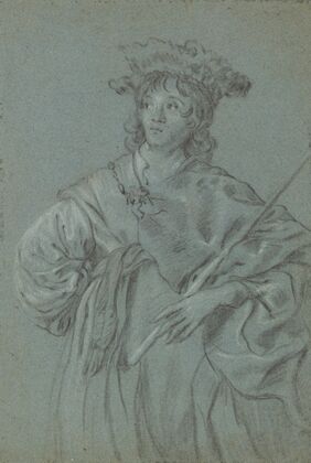A Young Man with a Fur Hat Holding a Staff