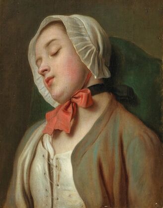 A Young Woman Sleeping In A Chair