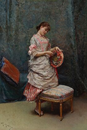 Aline Holding a Hat