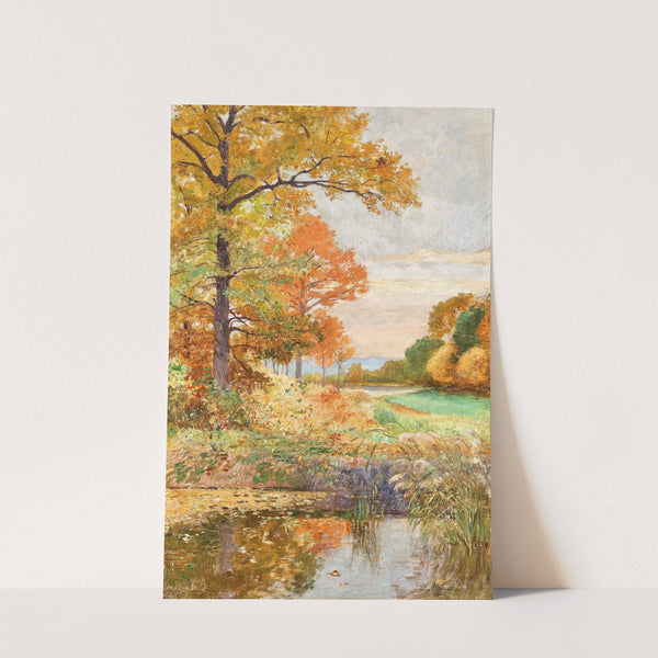 An autumnal landscape by Hugo Charlemont