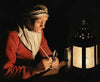 An old woman by candlelight