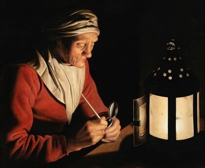 An old woman by candlelight
