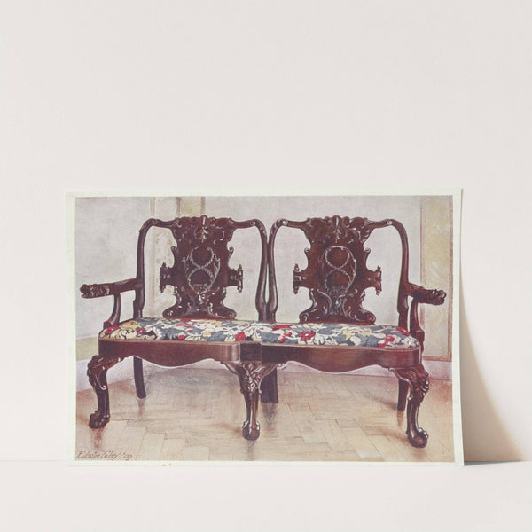 Carved walnut darby and Joan settee by Edwin Foley