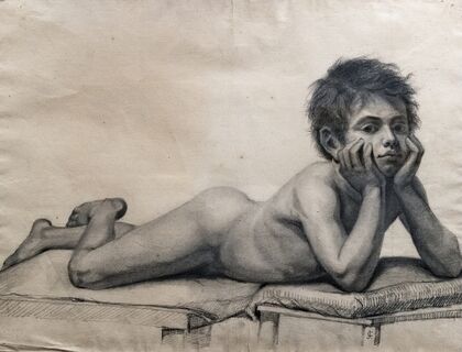 Child lying on stomach