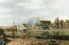 Children playing on the bank of a channel