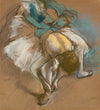 Danseuse attachant son chausson
