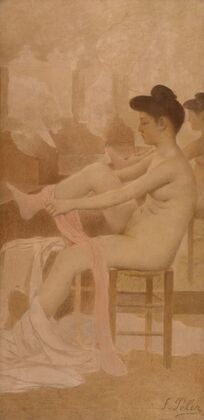 Danseuse dans sa loge enfilant un collant