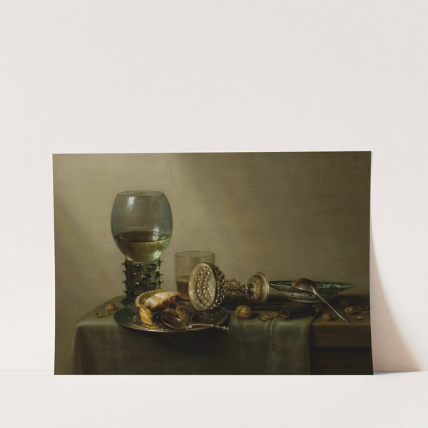 Dessert, still life with cake, wine, beer and nuts by Willem Claesz Heda