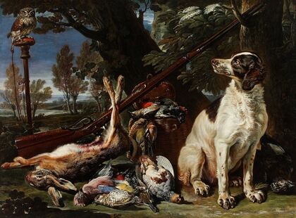 Dog, hunting trophies and an owl