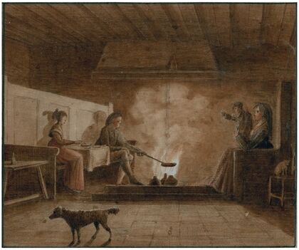 Familie rond de keukenhaard