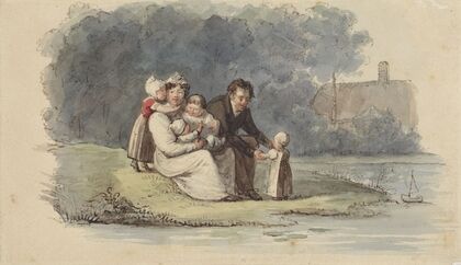 Familie zittend aan het water — size preview
