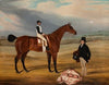 Foreigner with jockey up and his owner standing to the right