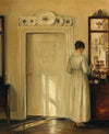 Frau beim Teekochen