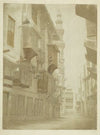Gezicht op een straat met minaret in Cairo (1858 - 1860)