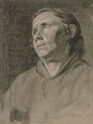 Head of a woman to the left