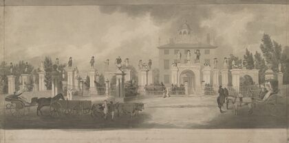 Home of Lord Timothy Dexter, Newburyport, Massachusetts with wooden statues on pillars and passersby enjoying the view