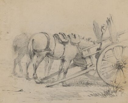 Horses eating from two-wheeled cart