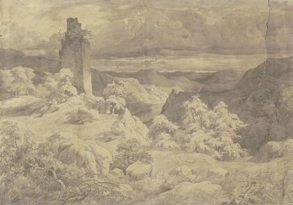 Hügelige Landschaft mit einer Turmruine