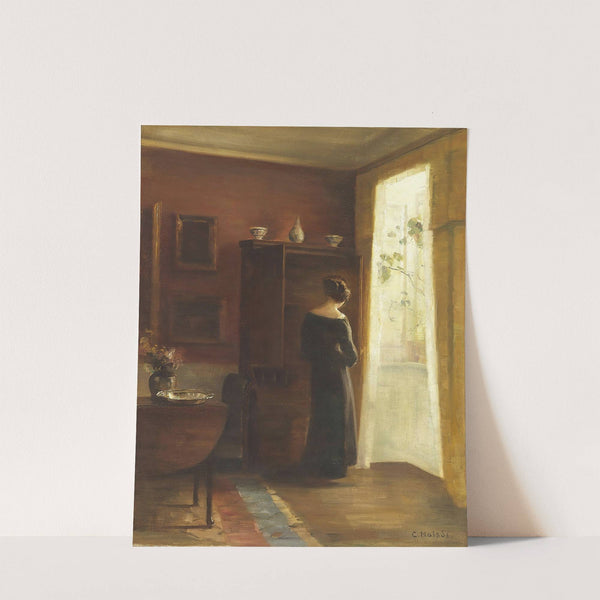 Interiør med ung pige stående ved vinduet by Carl Holsøe