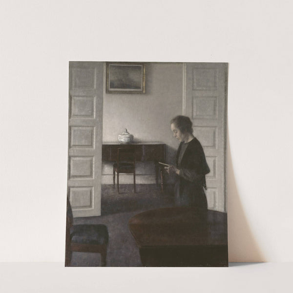 Interior with a Reading Lady by Vilhelm Hammershøi