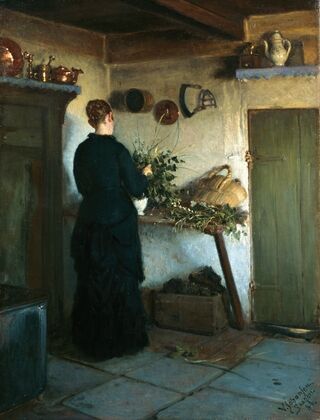 Kitchen interior. The artist’s wife arranging flowers