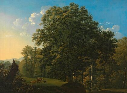 Landschaft mit weidenden Kühen