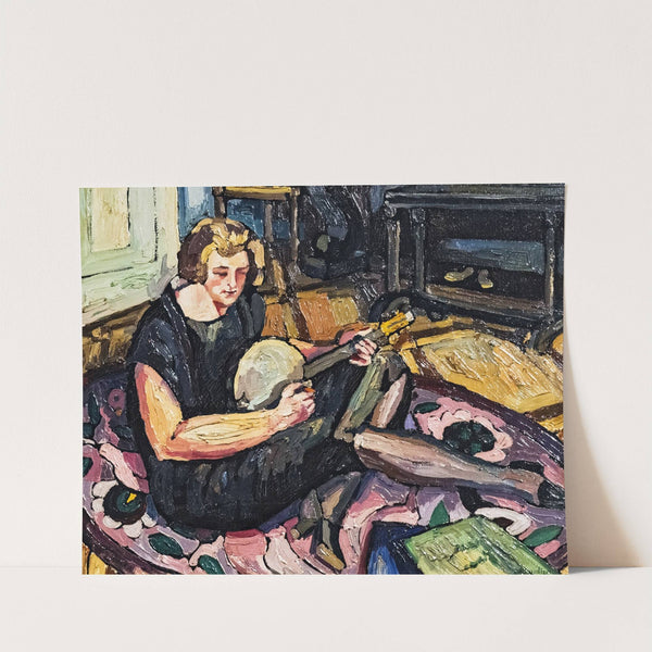 Luce on the banjo in the living room in Rabastens by Georges Gaudion