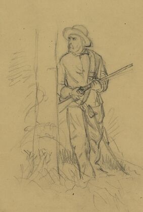Man with rifle peering around tree