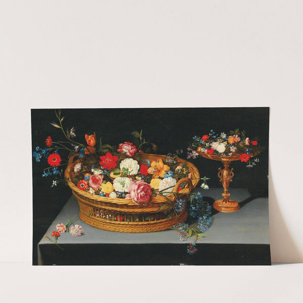 Mixed flowers in a basket with a tazza nearby by Jan Brueghel the Younger