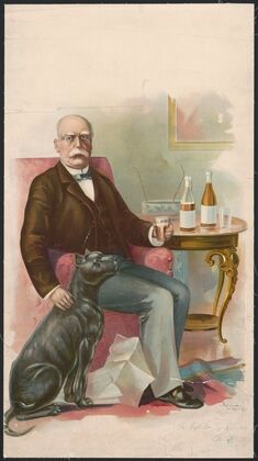 Older gentleman sitting in a chair, holding a glass of beverage, with a black dog sitting next to him (1897)
