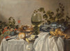 Ontbijt of silver and glassware on a draped table, with vines, fruits and baked goods