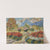 Pigeonnier dans un massif de fleurs by Victor Charreton