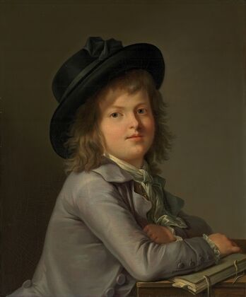 Portrait of a boy, in a black hat, leaning on a portfolio