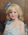 Portrait of a girl in a blue dress