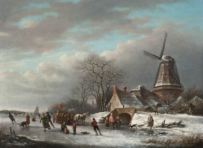 Skaters on a Dutch waterway by a windmill