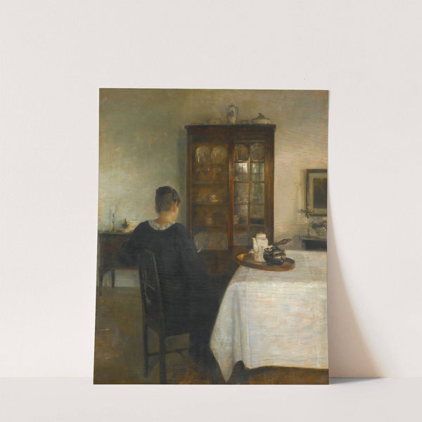 The artist's wife in an interior by Carl Holsøe