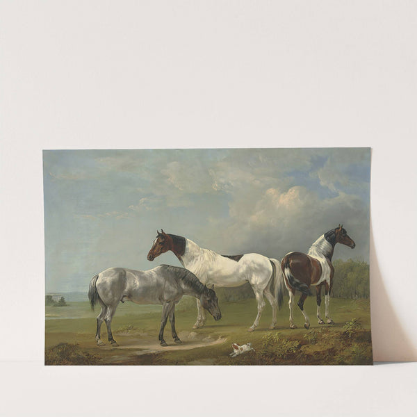 Two Skewbalds, a grey and spaniel in an extensive landscape, a country house beyond by Edmund Bristow